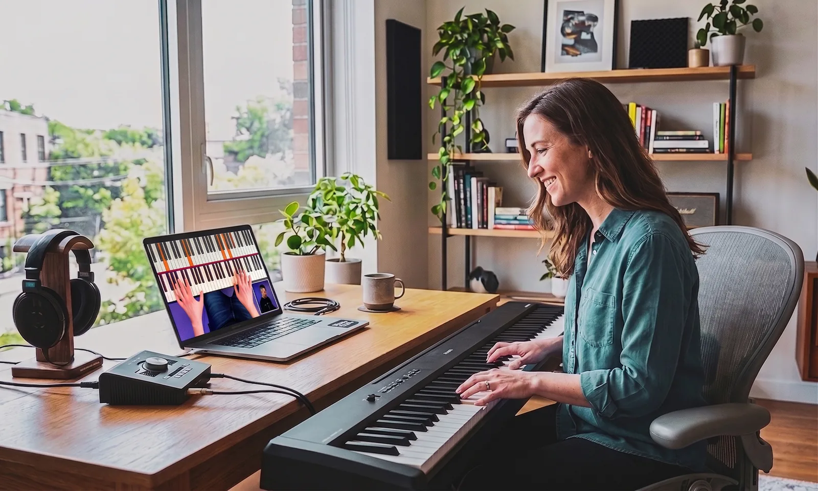 A student learning at home with a Keys Coach lesson on screen
