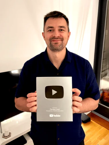 Adam with his YouTube play-button award