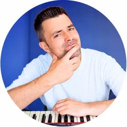Adam looking unsure at the keys